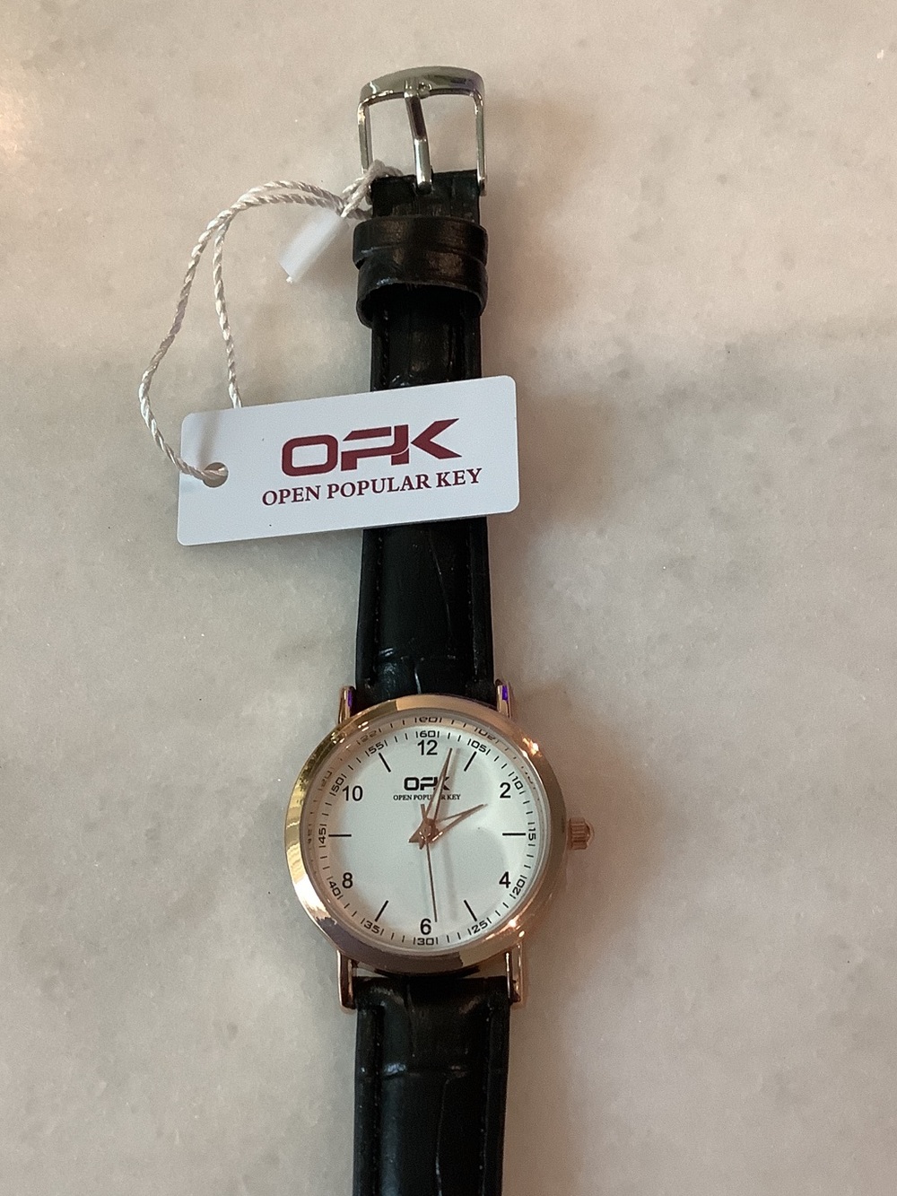 OPK Round Quartz Women’s Watch in Black and Rose Gold Tone, Brand New